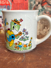 Load image into Gallery viewer, 1970s Vintage Turtle Coffee Mug Stoneware Psychedelic Flower Power Ukelele
